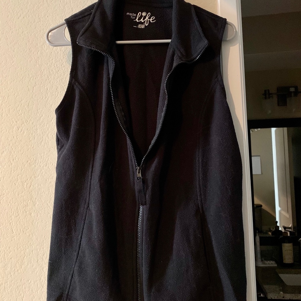 Fuzzy black vest.